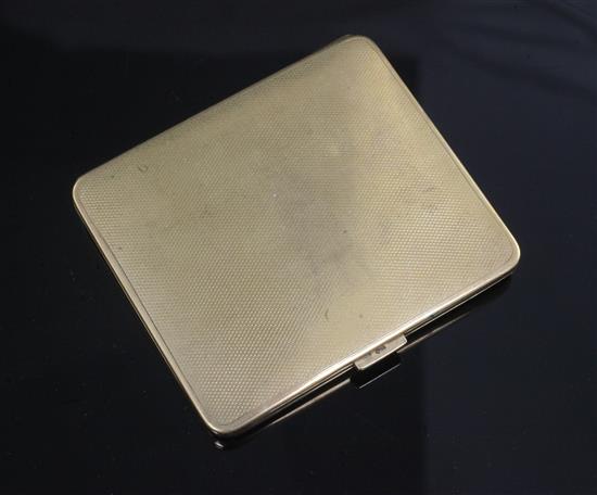A 1920s engine turned 9ct. gold cigarette case, 80mm.